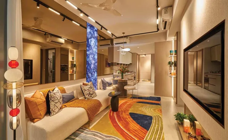 Promenade Peak interior, for illustration only: the living and dining room of a two-bedroom-and-study home of the Promenade Collection