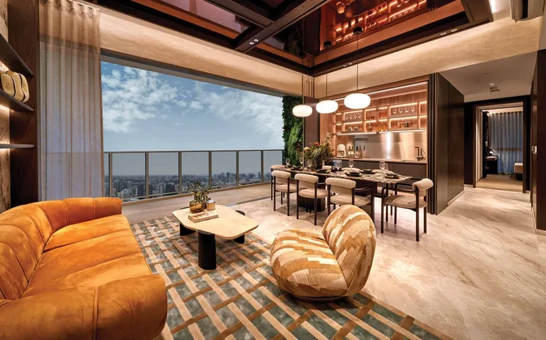 Promenade Peak interior, for illustration only: the living and dining room of a four-bedroom premium home of the Promenade Suites, with a wide window to the skyline
