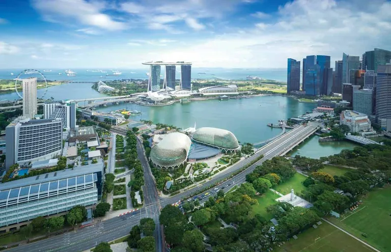Photograph of the area, for illustration only: Marina Bay from above, with the Esplanade theatres, the bay and the city skyline
