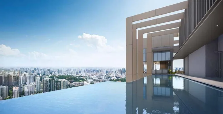 Promenade Peak, artist’s impression: the Sky Peak infinity pool on the roof, its edge meeting the city skyline beside the frame of the crown